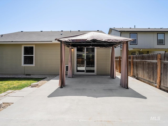 12800 W Fernleaf St, Boise, ID 83713 - back of property with a gazebo and a patio