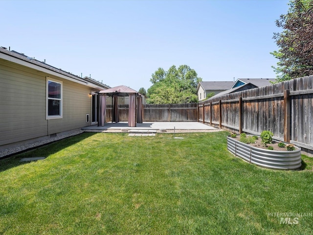12800 W Fernleaf St, Boise, ID 83713 - fenced backyard featuring a gazebo and a patio area