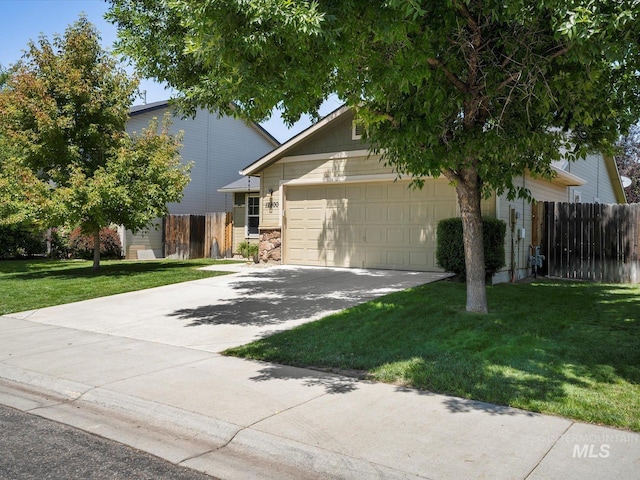 12800 W Fernleaf St, Boise, ID 83713 - obstructed view of property featuring a garage, driveway, and stone siding