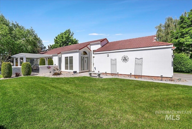 255 Los Lagos, Twin Falls, ID 83301 - mediterranean / spanish home featuring a pergola, a front lawn, a tiled roof, and stucco siding