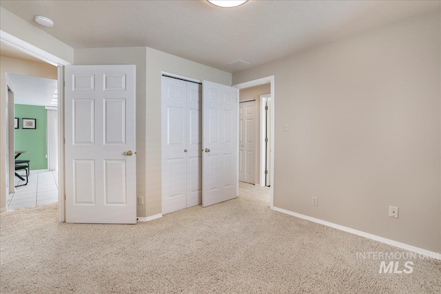 255 Los Lagos, Twin Falls, ID 83301 - unfurnished bedroom with carpet floors, baseboards, and a closet