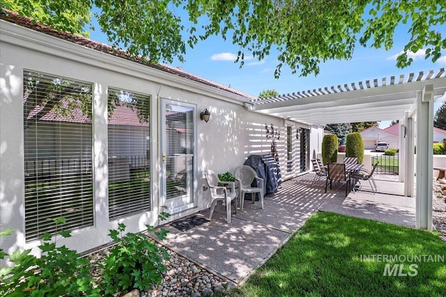 255 Los Lagos, Twin Falls, ID 83301 - view of patio / terrace with a pergola and outdoor dining space