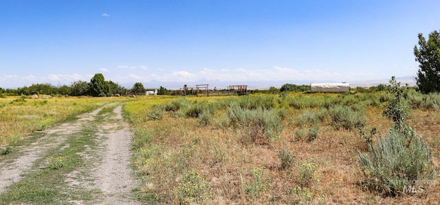 view of landscape featuring a rural view