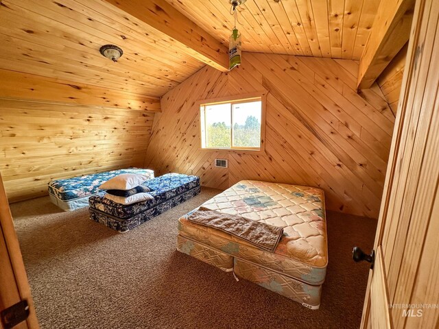 additional living space with a healthy amount of sunlight, wood walls, carpet floors, and wooden ceiling