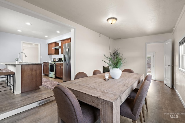 3209 W Plant Dr, Boise, ID 83703 - dining room with light wood-style floors, recessed lighting, and baseboards