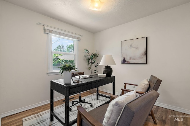 3209 W Plant Dr, Boise, ID 83703 - office with baseboards, wood finished floors, and a textured ceiling