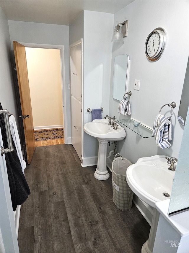 bathroom with sink and hardwood / wood-style floors