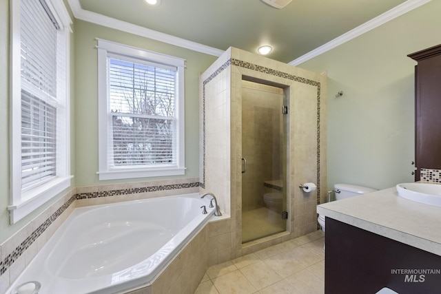 bathroom featuring tile patterned flooring, crown molding, vanity, a shower stall, and a bath