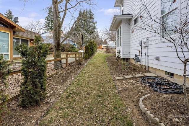 view of yard with fence