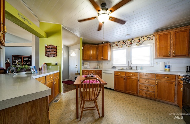 kitchen with white dishwasher, visible vents, light countertops, brown cabinets, and tasteful backsplash