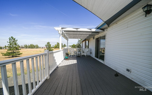 wooden terrace featuring a pergola