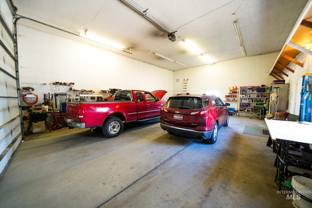 garage with a workshop area