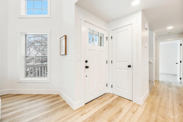 foyer featuring light wood-type flooring