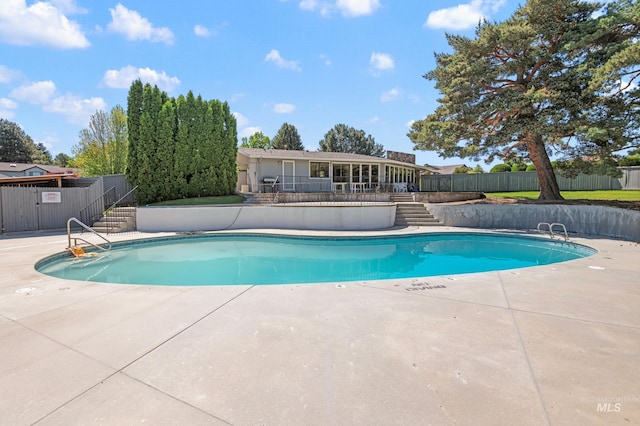 1664 E Sendero Ln, Boise, ID 83712 - community pool with a patio and stairs