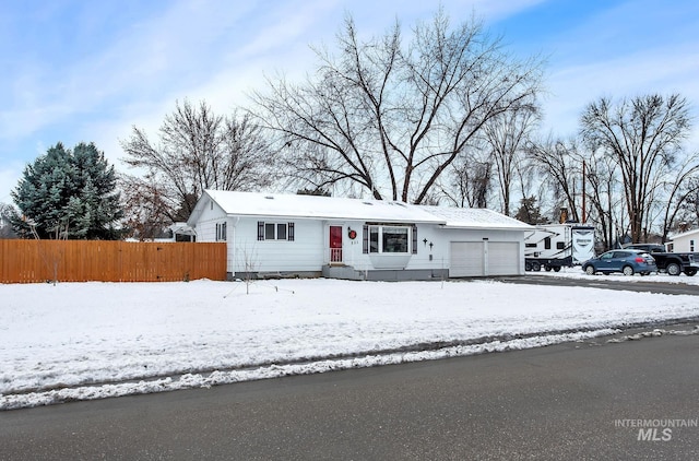 view of front of property featuring a garage