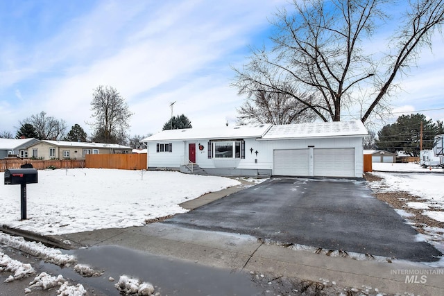 view of front of house with an outbuilding and a garage