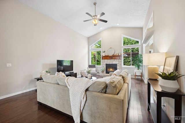 3376 E Echo Ct, Boise, ID 83712 - living area with ceiling fan, dark wood-type flooring, a stone fireplace, baseboards, and high vaulted ceiling