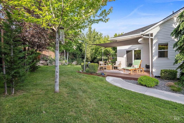 3376 E Echo Ct, Boise, ID 83712 - view of grassy yard with a wooden deck and an outdoor living space