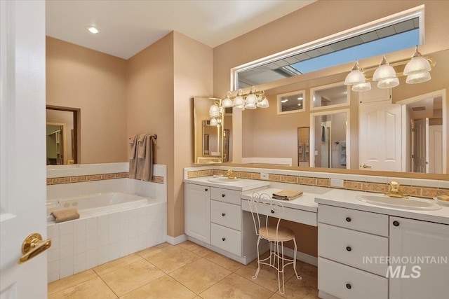 full bath with double vanity, tile patterned flooring, a sink, and a bath