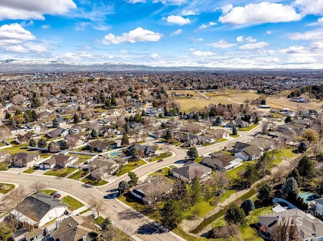 bird's eye view featuring a residential view and a mountain view