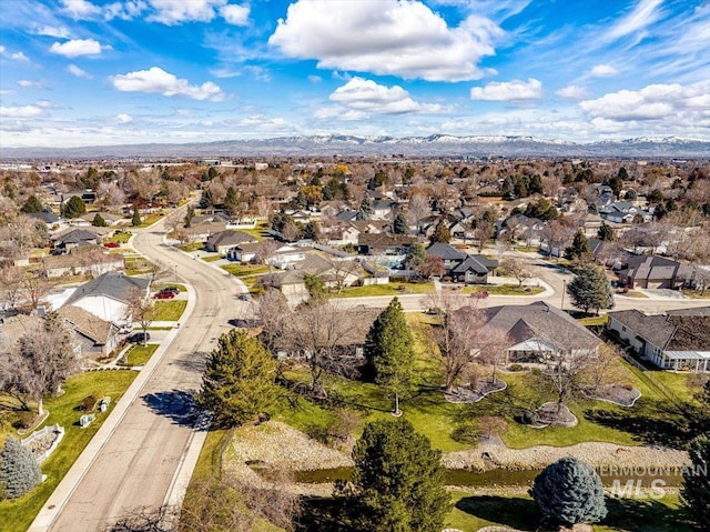 aerial view with a mountain view and a residential view