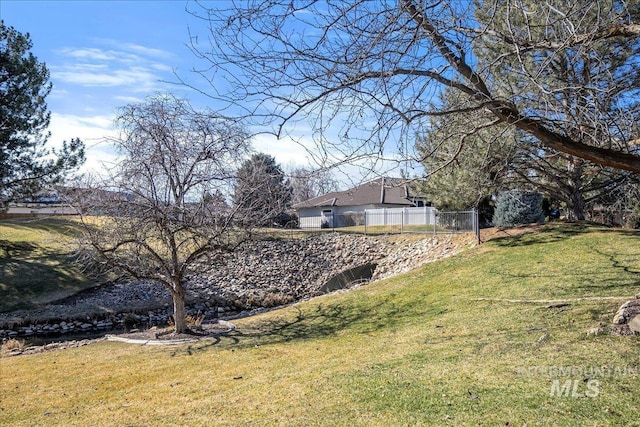 view of yard with fence