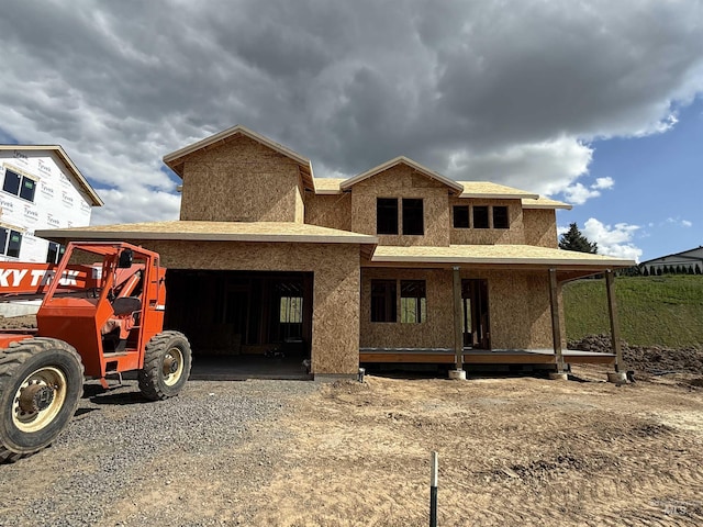 2463 E 3rd St, Moscow, ID 83843 - property in mid-construction with a garage, driveway, covered porch, and stucco siding