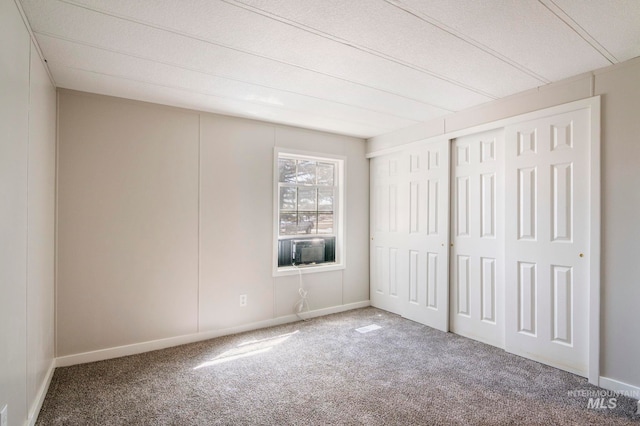 347 Winona Dr, Fairfield, ID 83327 - unfurnished bedroom with a closet, baseboards, and carpet floors