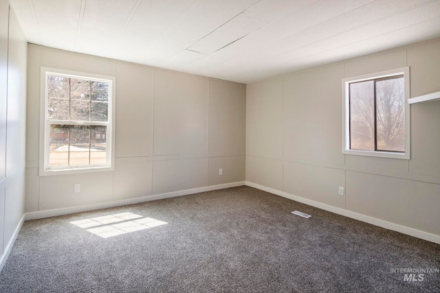 347 Winona Dr, Fairfield, ID 83327 - carpeted empty room with a decorative wall and baseboards