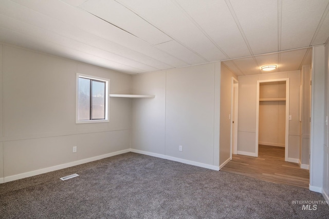 347 Winona Dr, Fairfield, ID 83327 - unfurnished bedroom featuring carpet flooring, baseboards, and visible vents