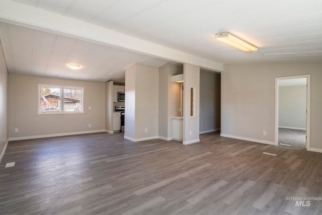 347 Winona Dr, Fairfield, ID 83327 - unfurnished living room featuring baseboards and wood finished floors