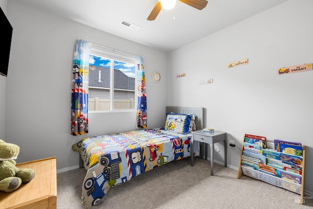 bedroom featuring carpet floors, baseboards, a ceiling fan, and visible vents