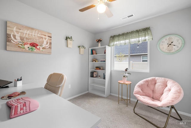 home office with baseboards, carpet, a ceiling fan, and visible vents