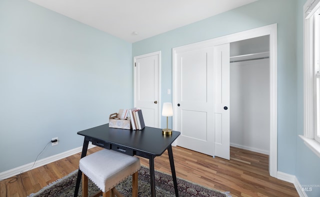 office with light wood finished floors and baseboards