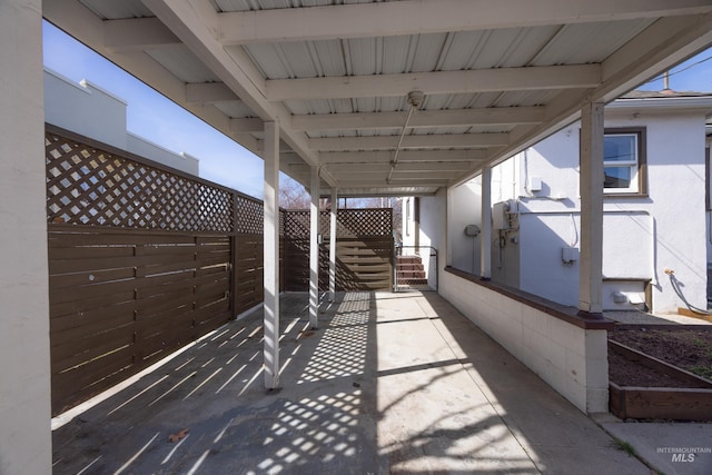 view of patio with fence