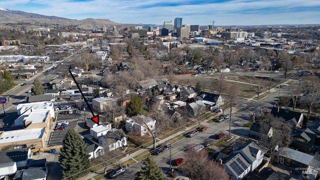 bird's eye view with a city view and a mountain view