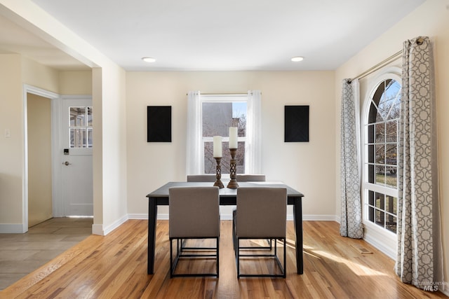 dining space featuring recessed lighting, wood finished floors, visible vents, and baseboards