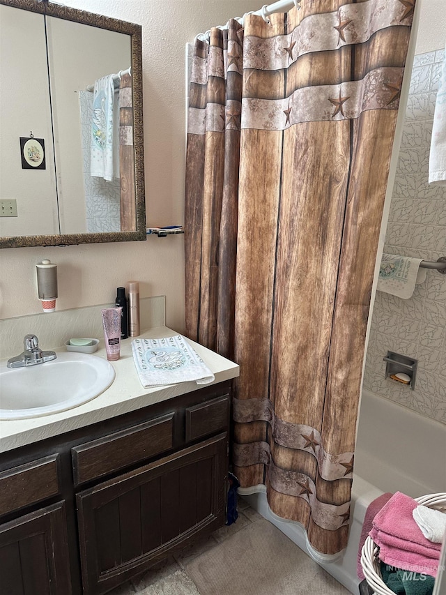 bathroom with vanity and shower / bathtub combination with curtain