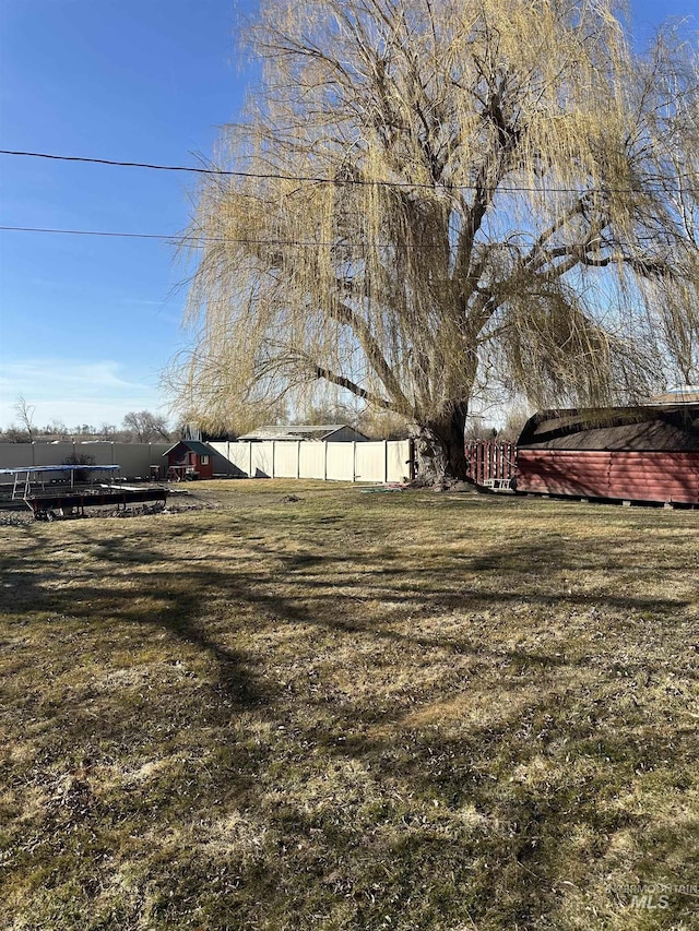 view of yard featuring fence