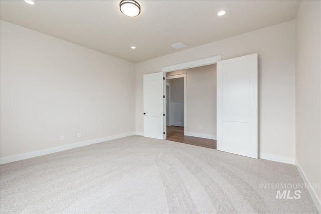 6201 W Redland Dr, Eagle, ID 83616 - empty room featuring baseboards, carpet, and recessed lighting