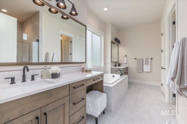 6201 W Redland Dr, Eagle, ID 83616 - bathroom with vanity, tile patterned floors, backsplash, a bath, and a stall shower