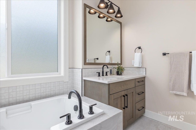6201 W Redland Dr, Eagle, ID 83616 - full bathroom featuring tile patterned floors, a bath, and vanity