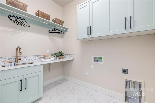 6201 W Redland Dr, Eagle, ID 83616 - laundry area featuring baseboards, hookup for a washing machine, electric dryer hookup, a sink, and cabinet space