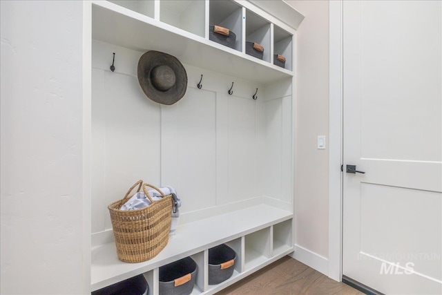 6201 W Redland Dr, Eagle, ID 83616 - mudroom featuring baseboards and wood finished floors