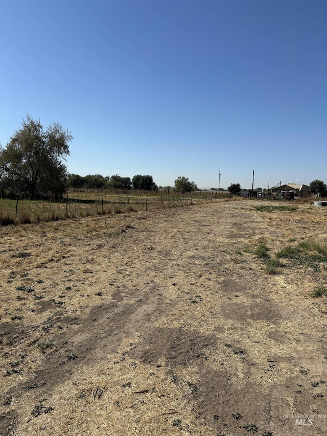 view of landscape featuring a rural view