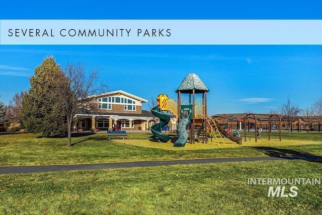 community play area featuring a lawn