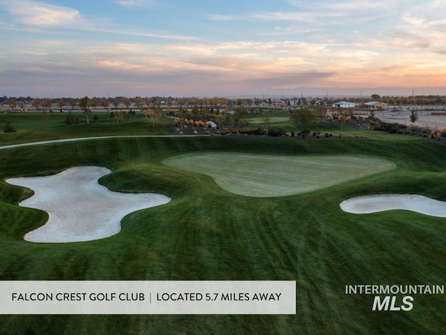 surrounding community featuring golf course view