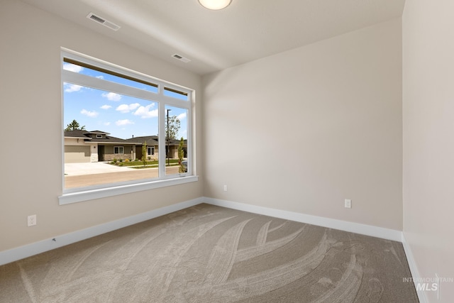 1785 E Grayson, Meridian, ID 83642 - carpeted spare room featuring baseboards