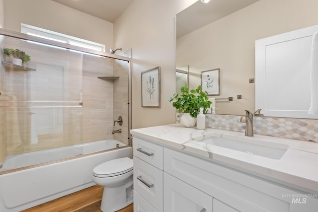 1785 E Grayson, Meridian, ID 83642 - full bath with vanity, toilet, wood finished floors, and enclosed tub / shower combo