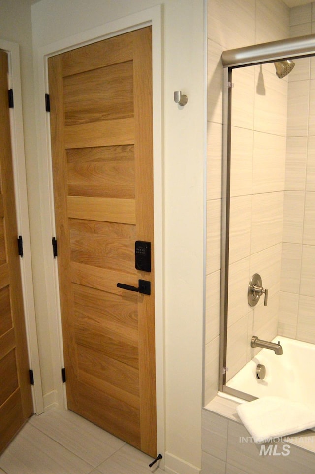 780 Village Dr Unit 308, Donnelly, ID 83615 - full bathroom with enclosed tub / shower combo and tile patterned floors